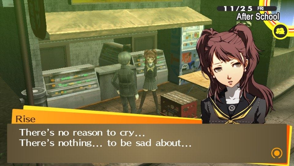 A scene from Persona 4 in which Rise Kujikawa is saying, 'There's no reason to cry... There's nothing... to be sad about... while looking dejected nonetheless.